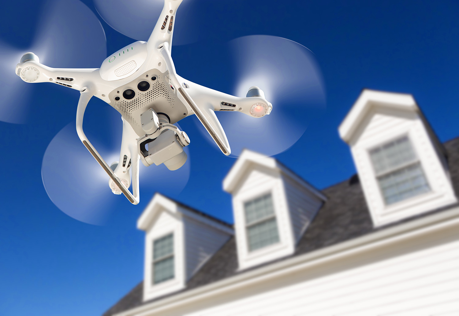 Drone flying over a house during a home inspection